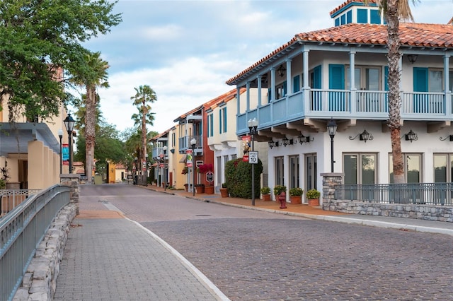 205 Bell Tower Xing W, Kissimmee, FL 34759 - view of decorative street featuring street lighting, curbs, sidewalks, and a residential view
