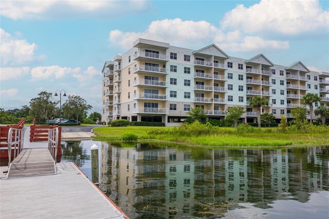 4177 N Orange Blossom Trl Unit 210, Orlando, FL 32804 - dock area featuring a water view