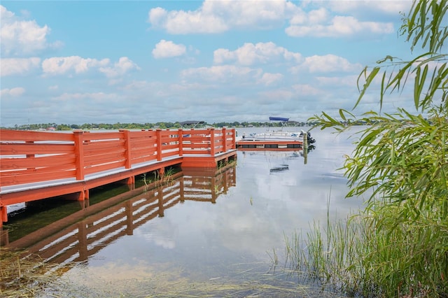 view of dock with a water view