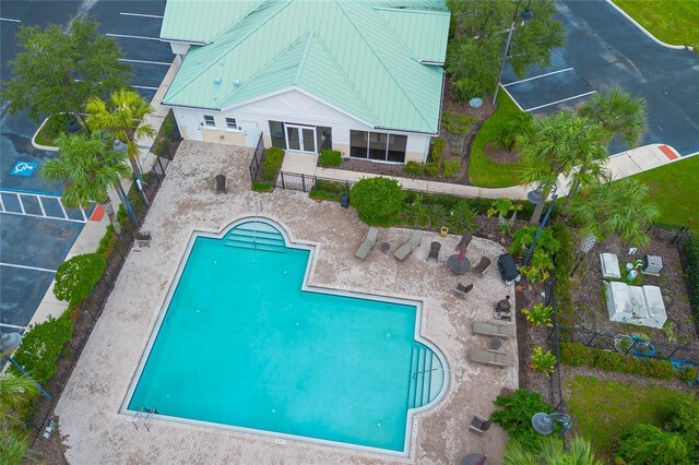 4177 N Orange Blossom Trl Unit 210, Orlando, FL 32804 - community pool with fence and a patio area