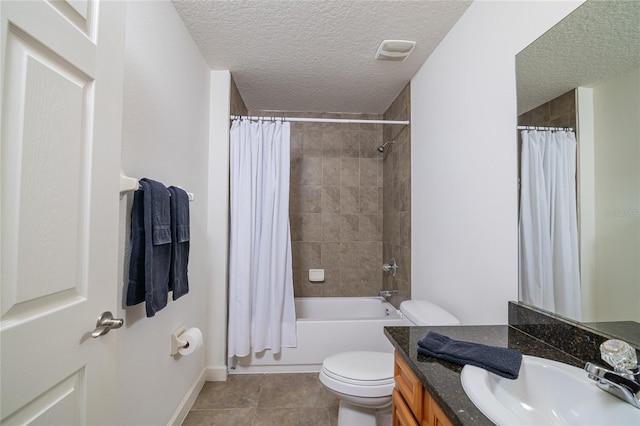 full bathroom with shower / tub combo, vanity, a textured ceiling, toilet, and tile patterned floors