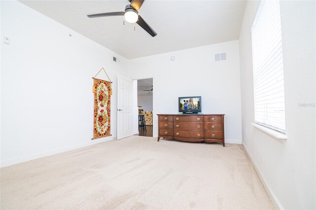 4177 N Orange Blossom Trl Unit 210, Orlando, FL 32804 - bedroom featuring carpet, a ceiling fan, and baseboards