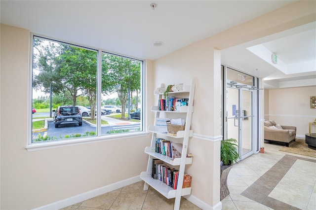 interior space with light tile patterned floors