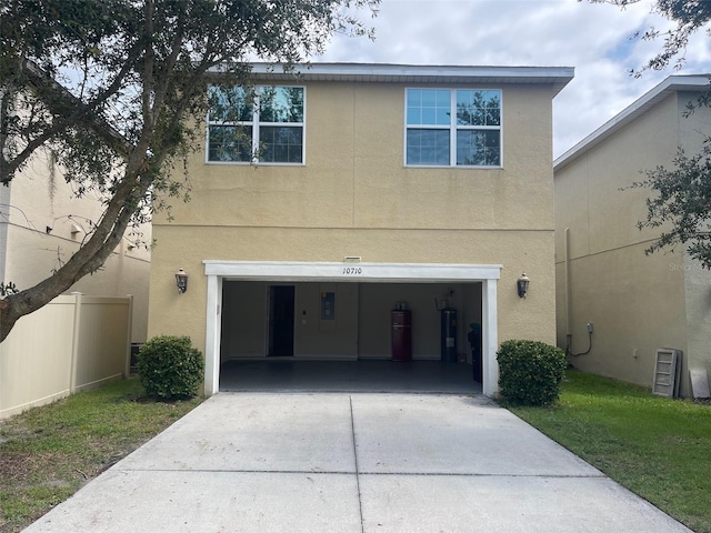 view of front of property with a garage