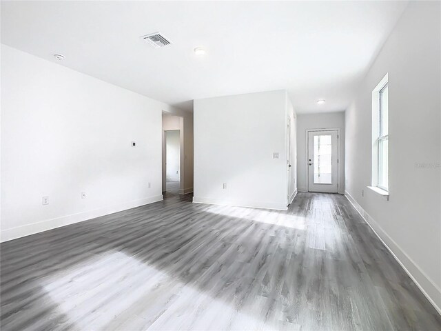 empty room featuring dark hardwood / wood-style floors