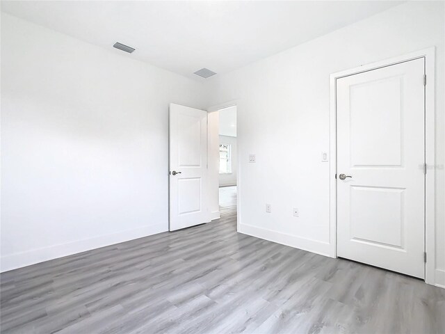 unfurnished bedroom featuring light hardwood / wood-style floors