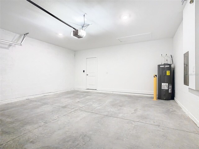 garage with electric water heater, a garage door opener, and electric panel