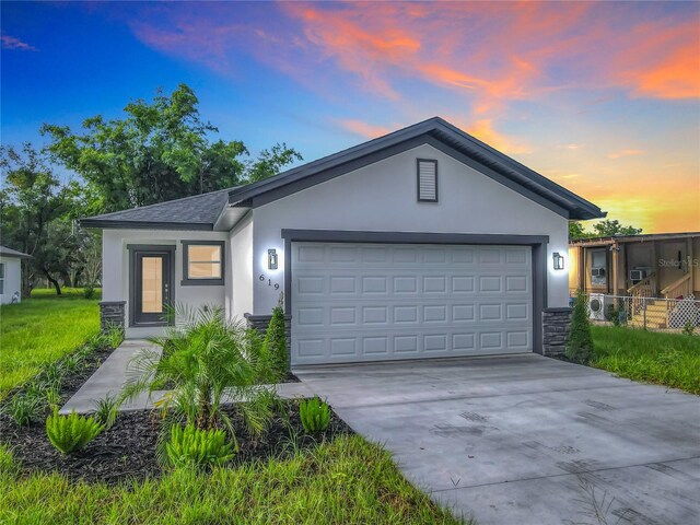 view of front of property with a garage