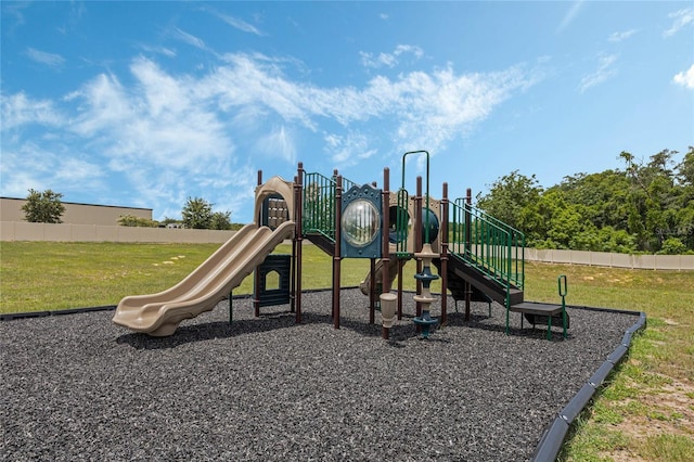 view of playground featuring a lawn