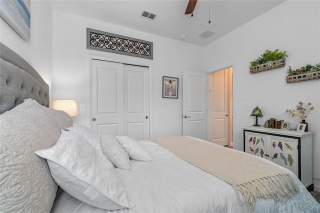 bedroom with ceiling fan and a closet