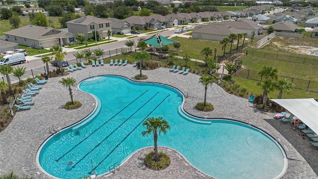 view of swimming pool with a patio area