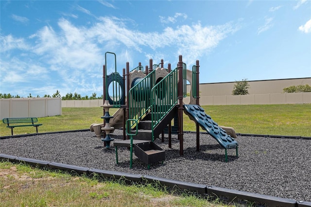 view of jungle gym with a yard