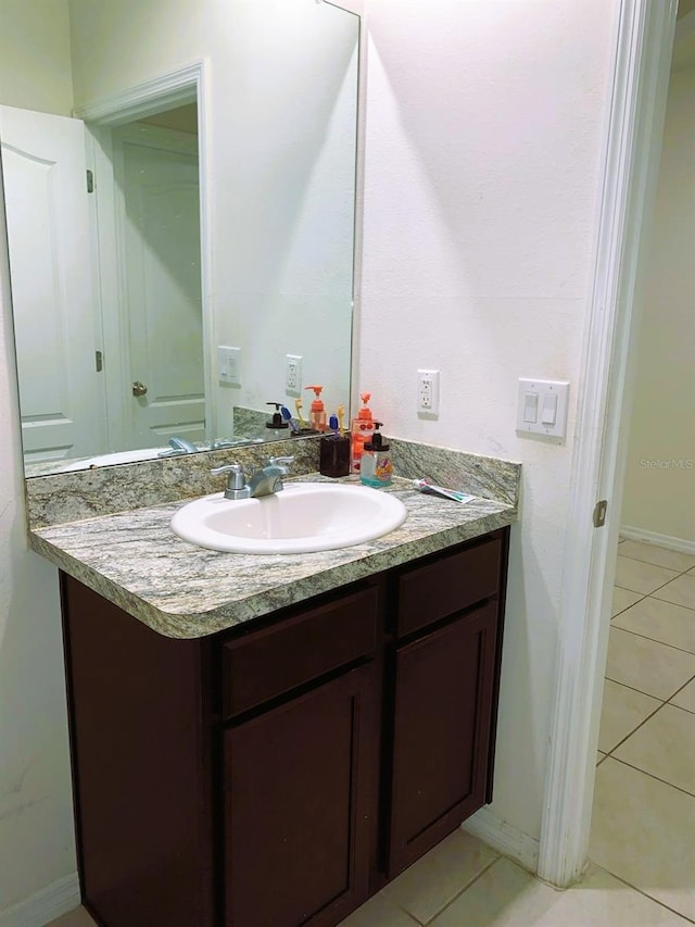 bathroom featuring vanity and tile patterned floors