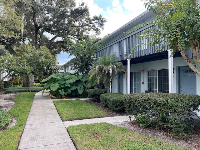 4814 Conway Rd Unit 141, Orlando, FL 32812 - view of property exterior featuring a balcony and stucco siding