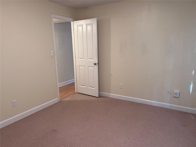 4814 Conway Rd Unit 141, Orlando, FL 32812 - unfurnished room featuring baseboards and light colored carpet