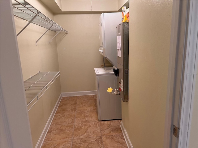 4814 Conway Rd Unit 141, Orlando, FL 32812 - washroom featuring baseboards and cabinet space