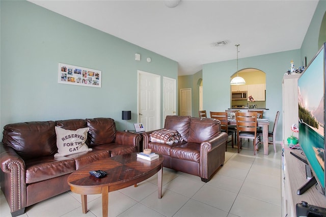 living room with light tile patterned floors