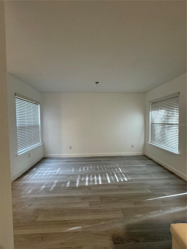 empty room featuring hardwood / wood-style floors