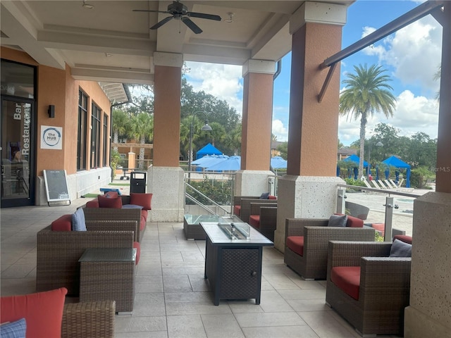 view of patio / terrace featuring ceiling fan and outdoor lounge area