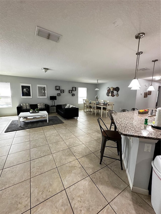 interior space with a textured ceiling