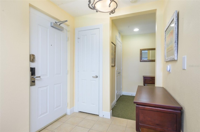 foyer with light tile patterned floors