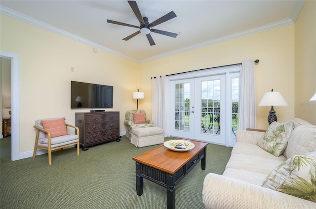 living room with carpet floors, ornamental molding, ceiling fan, and french doors