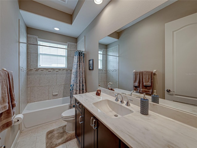 full bathroom with tile patterned flooring, vanity, toilet, and shower / bath combination with curtain