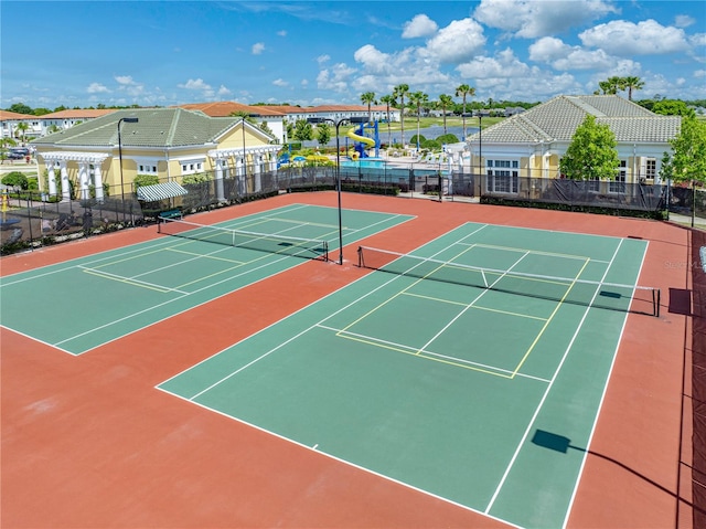 view of tennis court with basketball court