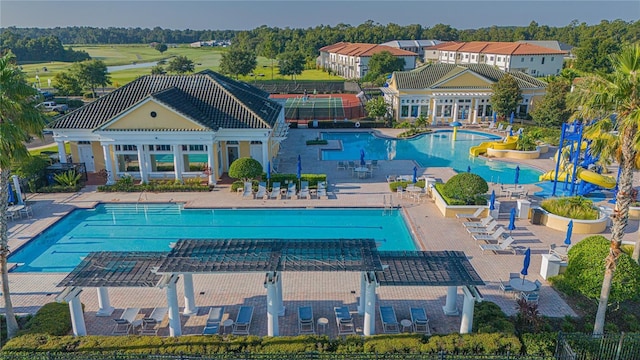 view of swimming pool with a patio area