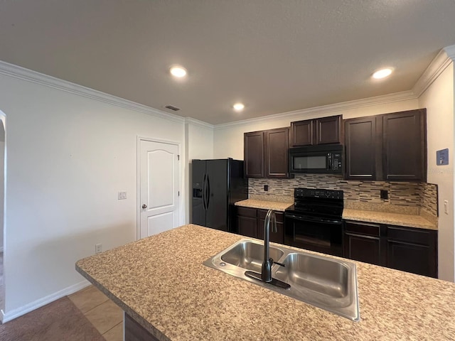 kitchen with light tile patterned floors, ornamental molding, sink, and black appliances