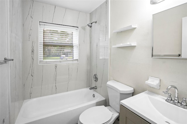 full bathroom featuring vanity, toilet, and tiled shower / bath