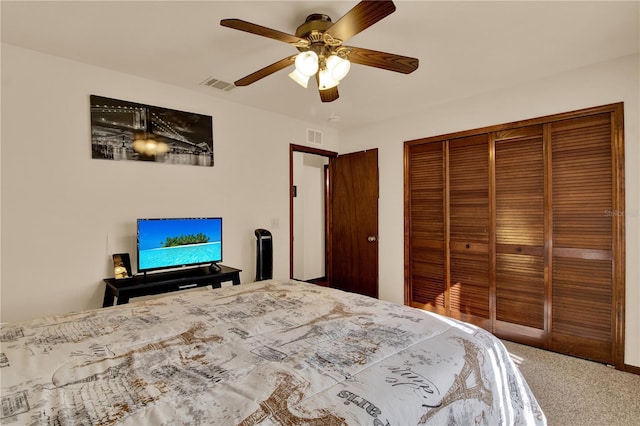 carpeted bedroom featuring ceiling fan