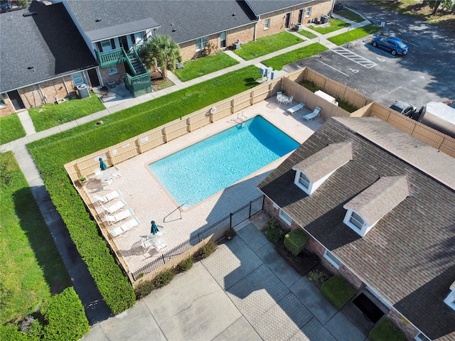 view of swimming pool featuring a patio area