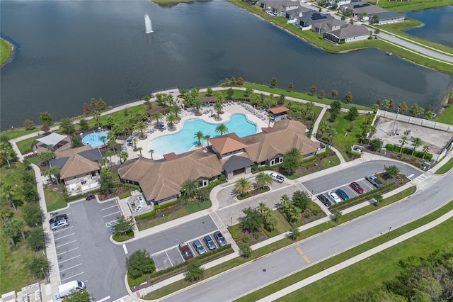 birds eye view of property featuring a water view