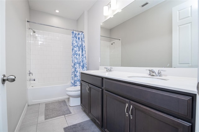 full bathroom featuring tile patterned floors, vanity, shower / bathtub combination with curtain, and toilet