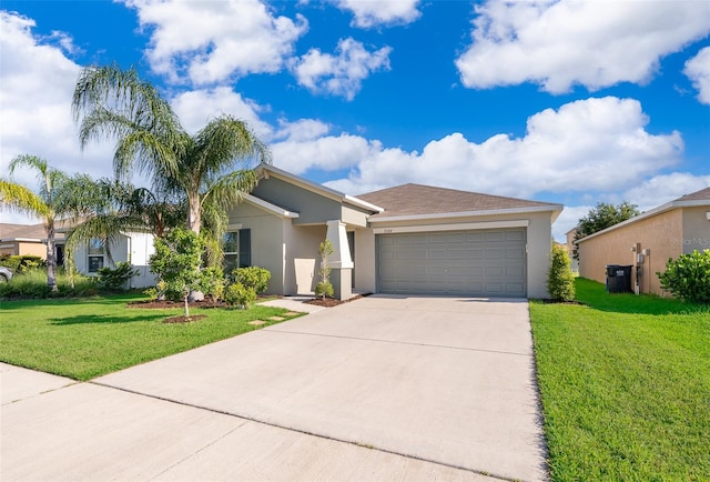 view of front of home featuring a garage and a front yard