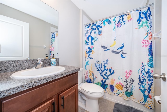 full bathroom featuring shower / bath combo, vanity, toilet, and tile patterned floors