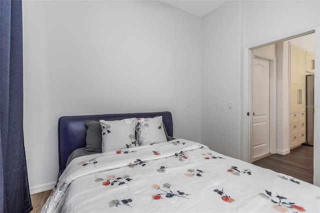 2228 Valrico Forest Dr, Valrico, FL 33594 - bedroom featuring dark hardwood / wood-style flooring