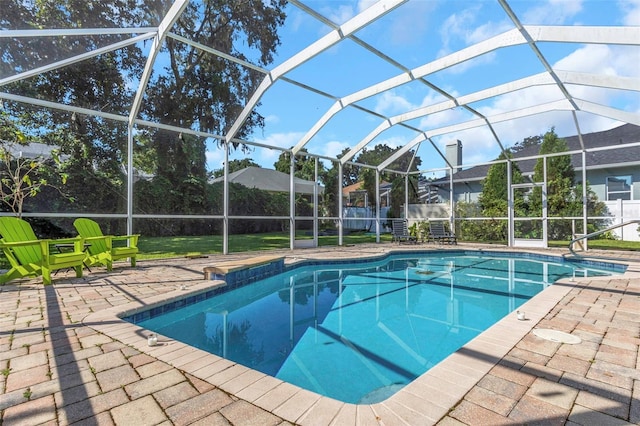 2228 Valrico Forest Dr, Valrico, FL 33594 - view of pool featuring glass enclosure and a patio area