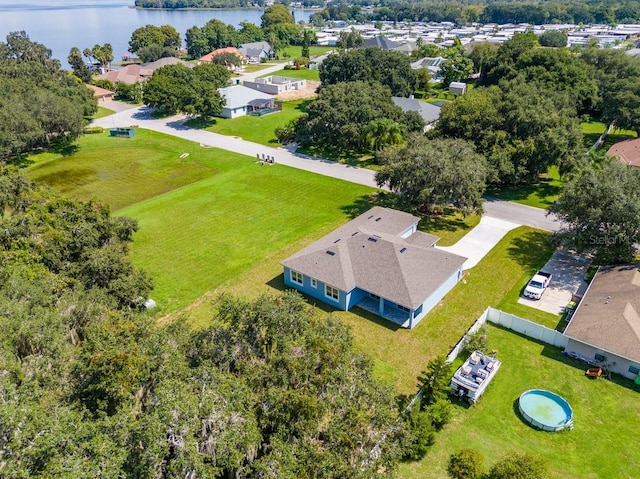 drone / aerial view with a water view