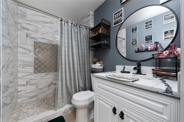 bathroom with a shower with curtain, vanity, and toilet