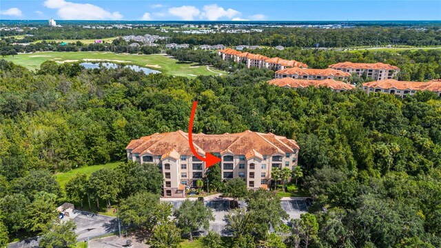 1301 Tuscan Ter Unit 9403, Davenport, FL 33896 - bird's eye view of a local golf course, apartment complex, and a large body of water