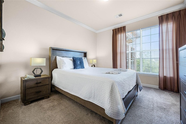 carpeted bedroom with crown molding