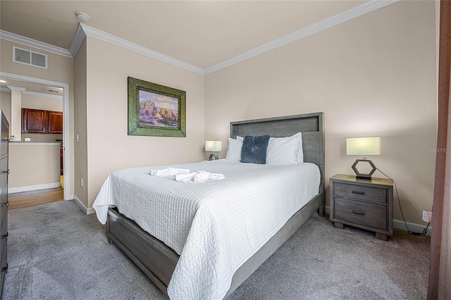 bedroom with carpet flooring and crown molding