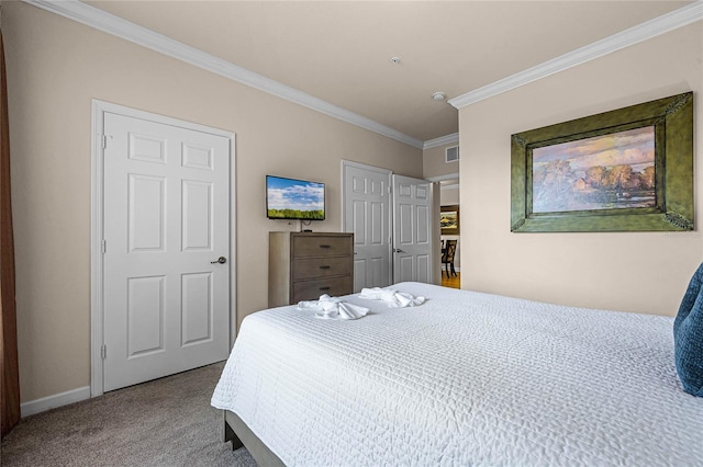 carpeted bedroom with ornamental molding