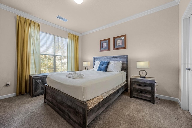 bedroom featuring ornamental molding and carpet flooring