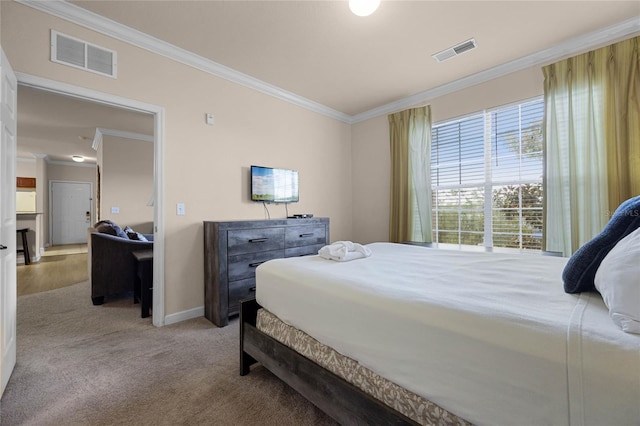 bedroom with light carpet and crown molding