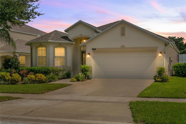 view of front of property featuring a garage