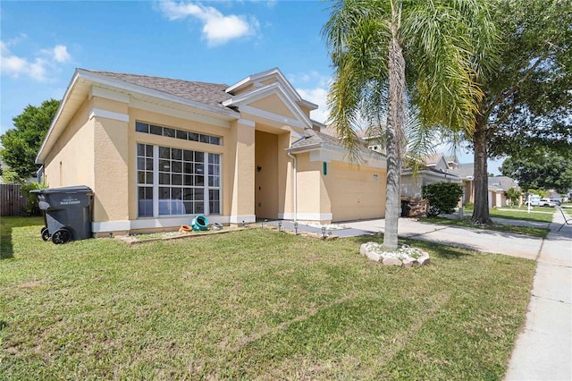 ranch-style house with a garage and a front yard