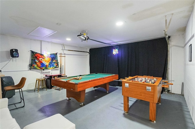 recreation room featuring concrete flooring and pool table